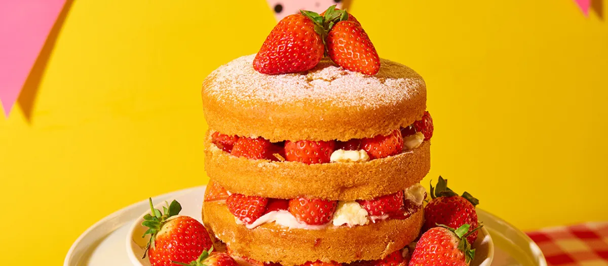 Three tier Victoria Sponge cake with strawberries