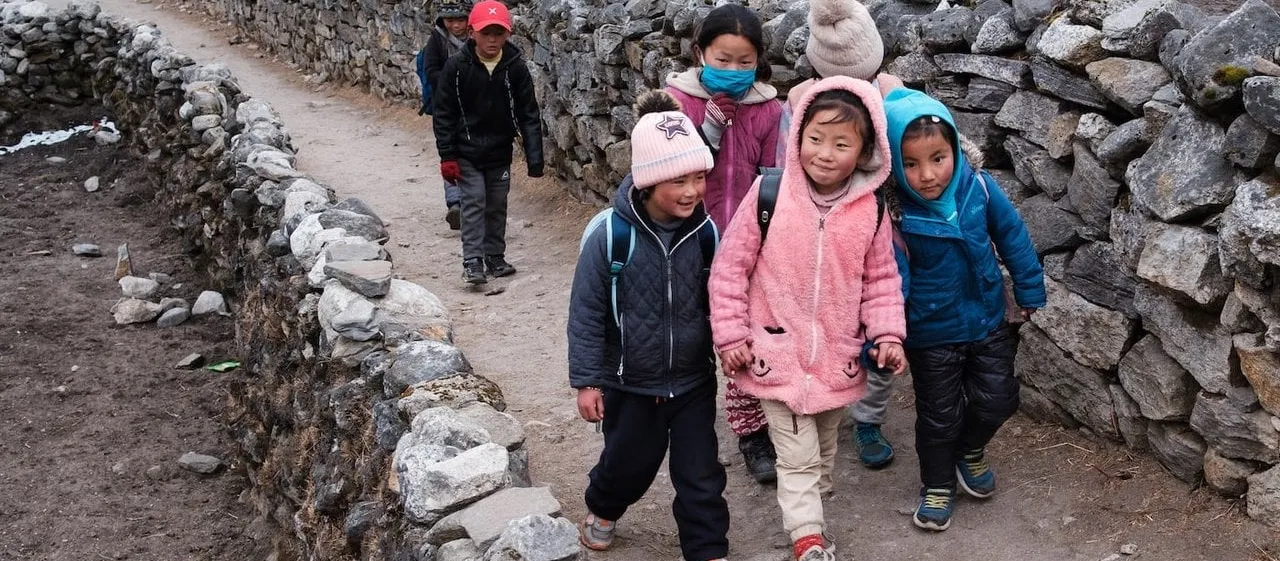 Children walking together in Nepal